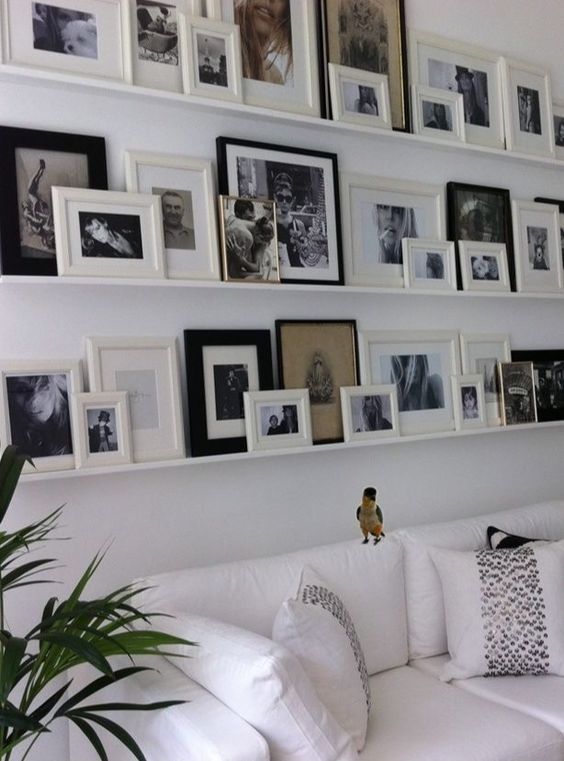 12 Ways To Display Your Gallery Wall - Layered Shelving 