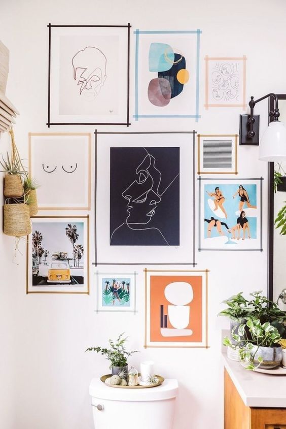 12 Ways To Display Your Gallery Wall - Taped Wall