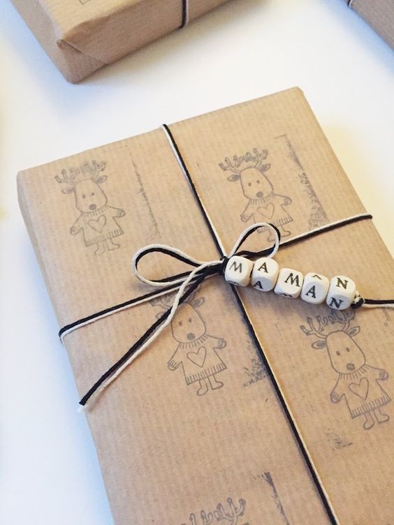 Brown paper gift wrap with ink stamps 