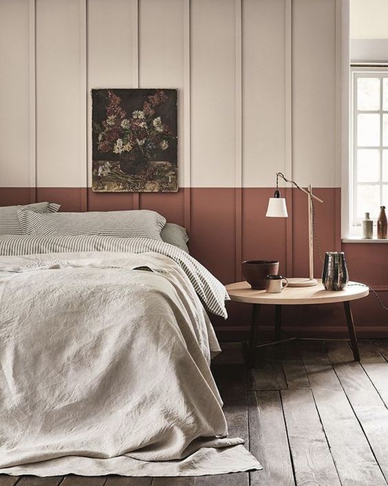 Colored Panel Walls - 17 Interiors That Will Make You Fall in Love With Panelled Walls - A traditional bedroom design that featured panel strip wall design the cream and the rust colors adds a modern twist to the design. @chloedominik #panelledwalls #panelledwallbedroom #panelledwallbedroomideas  #coloredpanelwalls #wallpanellingcolor #panelwalls #panelledinteriors #panelledinteriorwalls #panelwallideas #panelwalldesigns