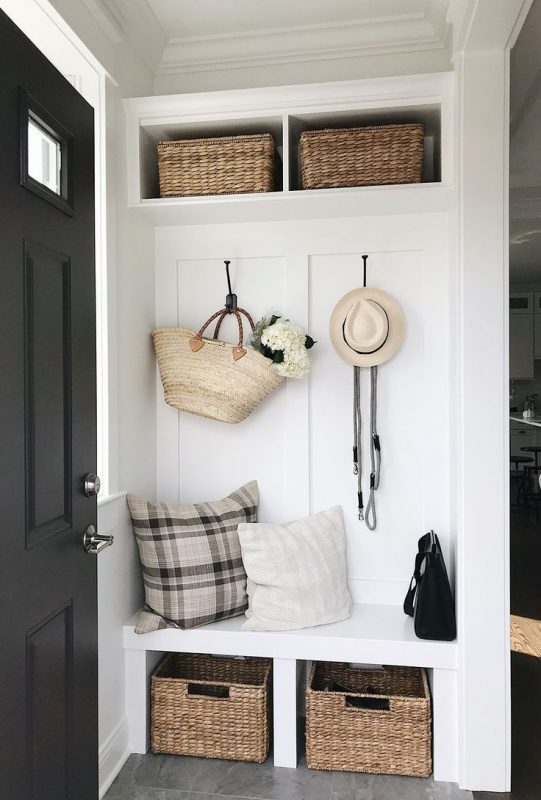 Built In Hallway Seating - 7 Great Tips To Organize & Style Your Hallway: A beautiful hallway entrance built in provides a great storage solution with a bench for seating to keep the front of the home neat and organized while looking great. #hallwaystorage #hallwaystorageideas #hallwaystoragebench #hallwaybuiltins #hallwaybuiltinstorage #organizehallway #hallwayorganizationstorage #hallwayorganizationideas