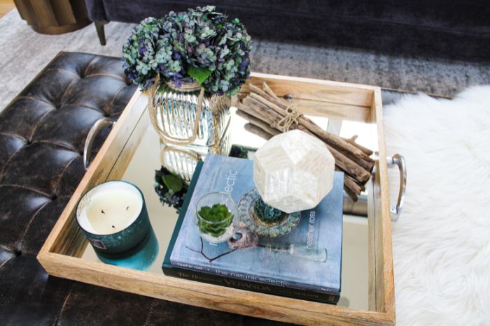 Styling areas like your coffee tables can make your living room feel more elegant 