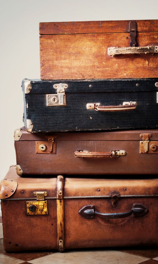 antique suitcases as a nightstand
